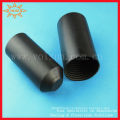 Adhesive-lined heat shrinkable rubber cable end cap